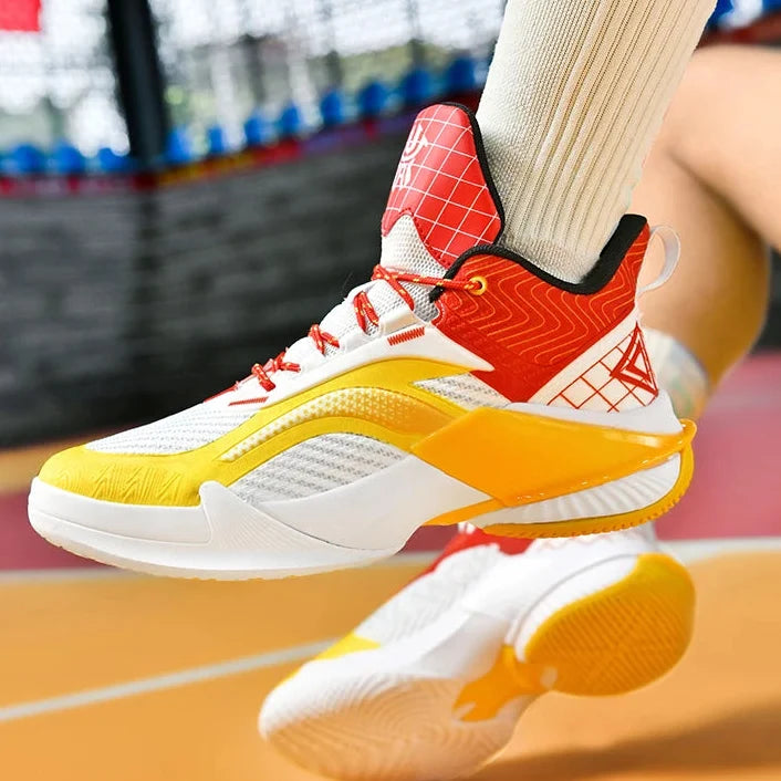 Bounce Pro court shoe in white, yellow and red, worn by a player.