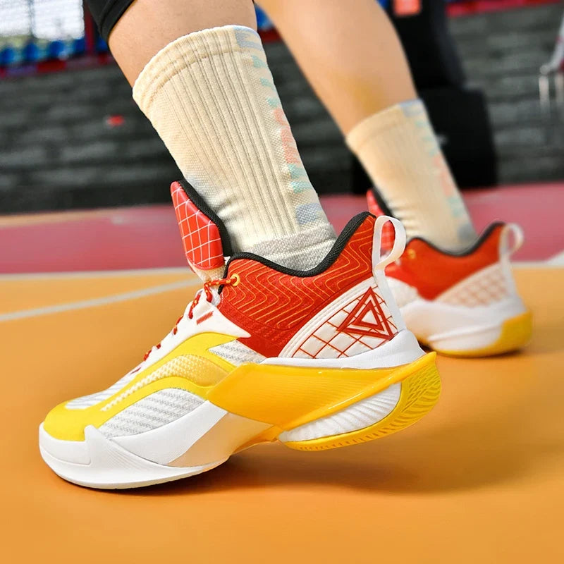 Bounce Pro court shoe in white, yellow and red, worn by a player.
